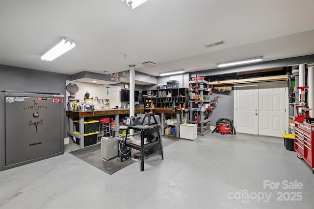 garage featuring a workshop area