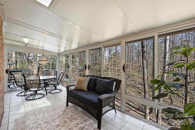 sunroom with lofted ceiling