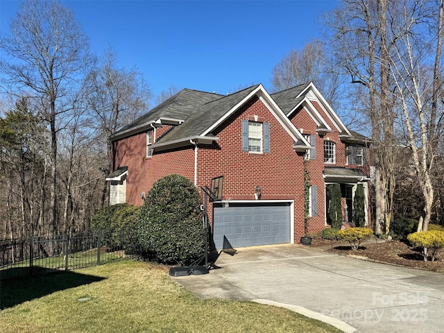 view of property exterior featuring an attached garage, brick siding, fence, a yard, and concrete driveway