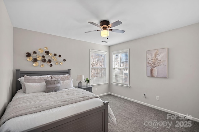 carpeted bedroom featuring a ceiling fan and baseboards