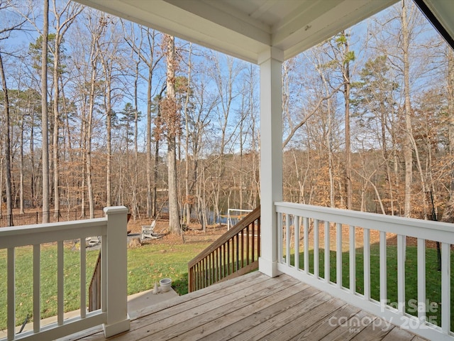 deck featuring a lawn