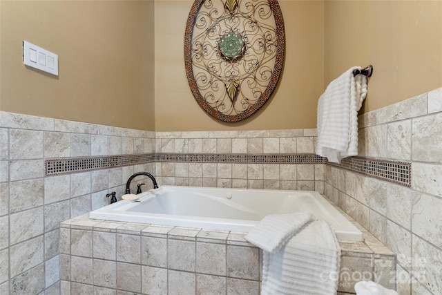 full bathroom with a relaxing tiled tub