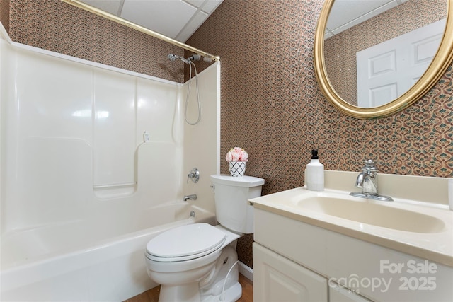 full bathroom with toilet, wallpapered walls, bathtub / shower combination, and vanity