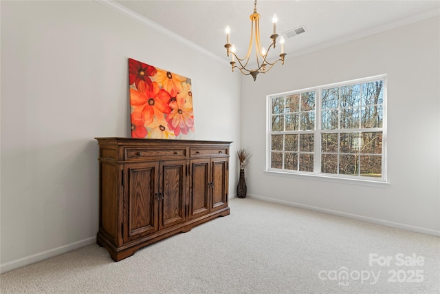 empty room featuring crown molding, light colored carpet, visible vents, and baseboards