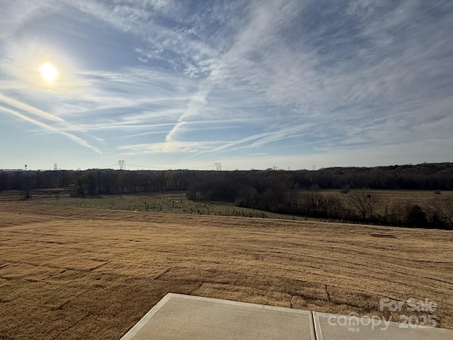 view of landscape with a rural view