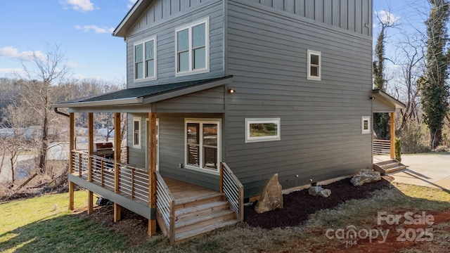 back of house featuring board and batten siding