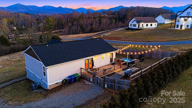 aerial view at dusk with a mountain view