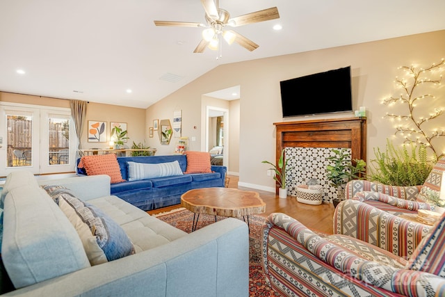 living area featuring recessed lighting, ceiling fan, vaulted ceiling, wood finished floors, and baseboards