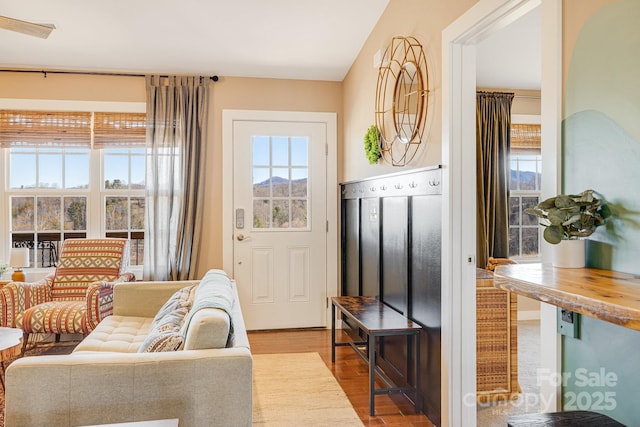 interior space featuring plenty of natural light and wood finished floors