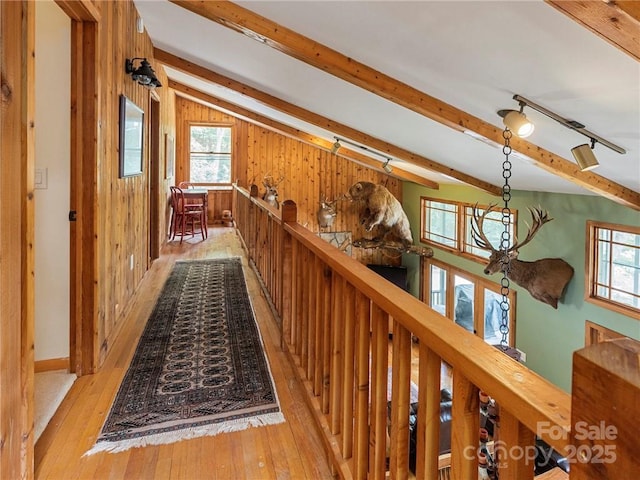 167 Bold Springs Rd, Sylva, NC 28779 - corridor featuring wooden walls, beamed ceiling, hardwood / wood-style floors, and track lighting