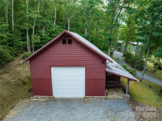 167 Bold Springs Rd, Sylva, NC 28779 - detached garage with driveway and a forest view