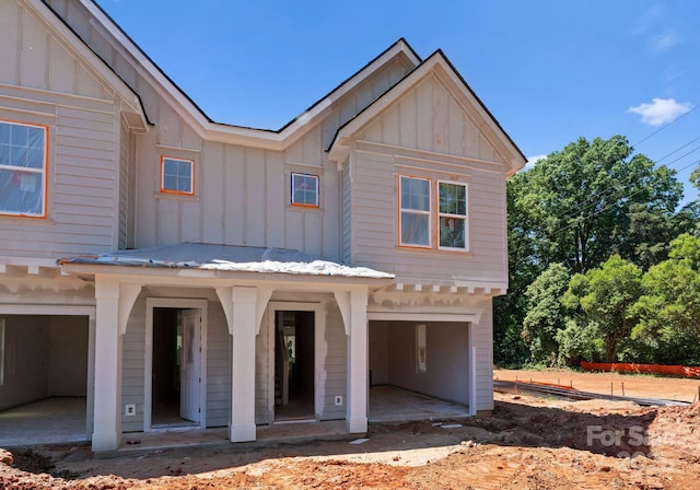 view of front of property with board and batten siding and a garage