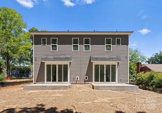 back of house featuring a patio