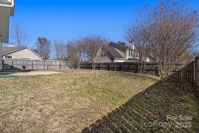 view of yard featuring a fenced backyard and a patio