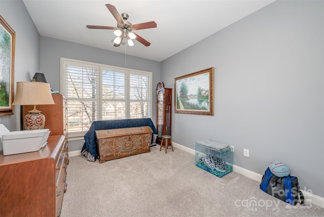 bedroom featuring carpet, a ceiling fan, and baseboards