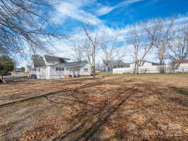 view of yard with fence