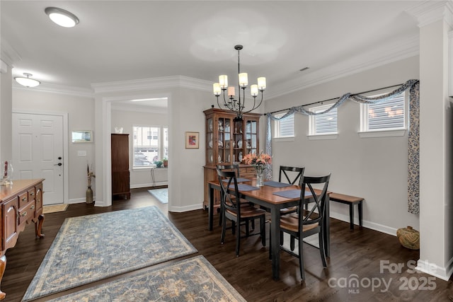 dining room with ornamental molding and dark wood-type flooring