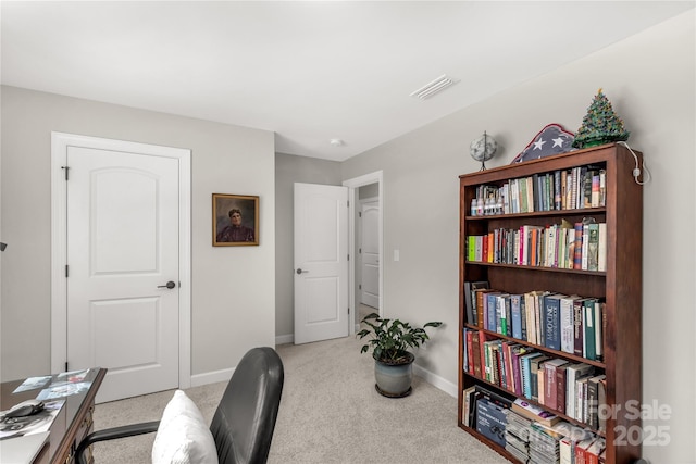 home office with baseboards, visible vents, and carpet flooring