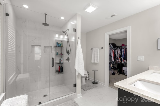 full bath with double vanity, a stall shower, visible vents, marble finish floor, and recessed lighting