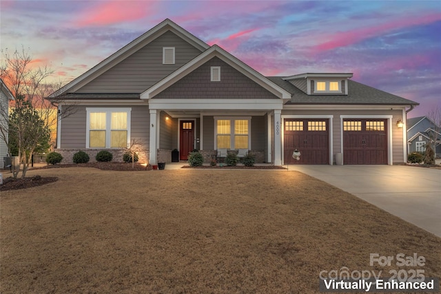 craftsman inspired home with driveway, a garage, a shingled roof, a lawn, and a porch