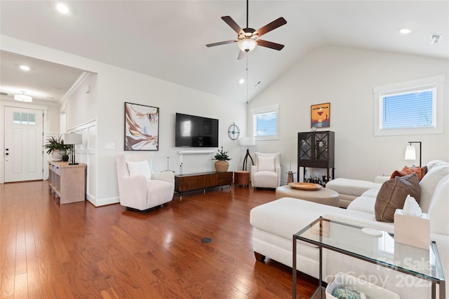 living room featuring lofted ceiling, ceiling fan, wood finished floors, and recessed lighting