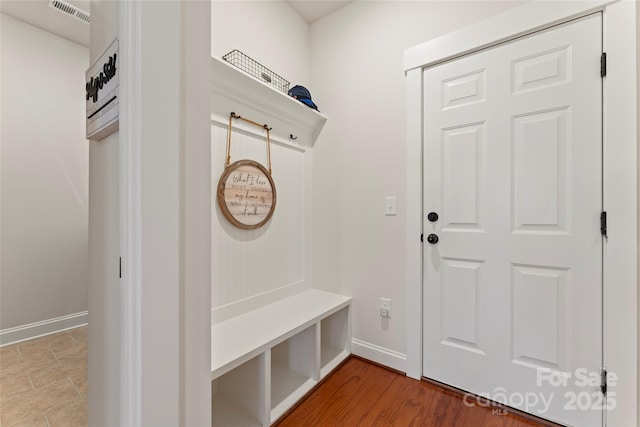 mudroom with visible vents and baseboards