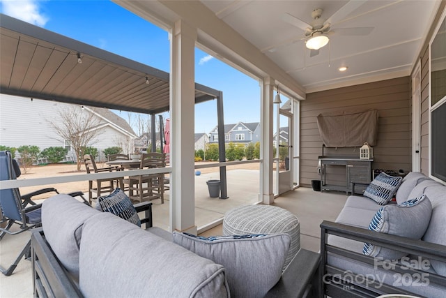 view of patio / terrace with a ceiling fan and an outdoor hangout area