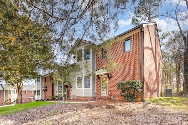 view of front of house with brick siding