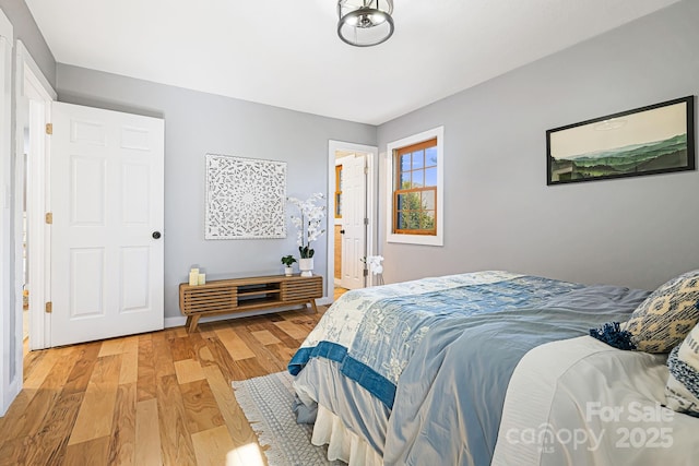 bedroom featuring light wood finished floors