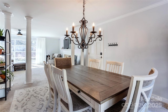 dining area with ceiling fan, ornamental molding, decorative columns, and light colored carpet