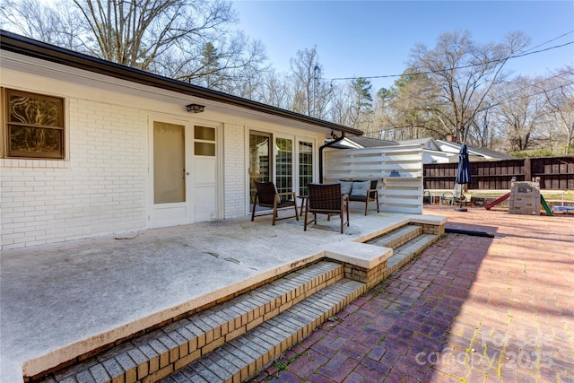 view of patio with fence