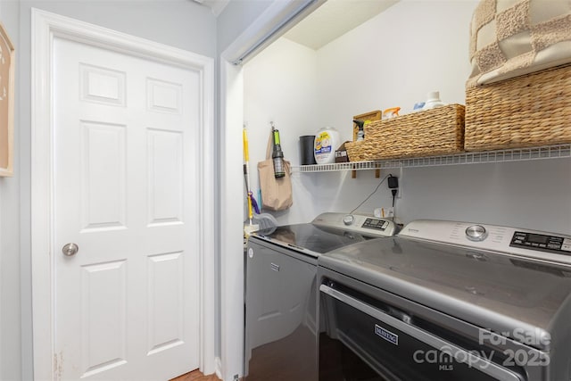 washroom featuring separate washer and dryer