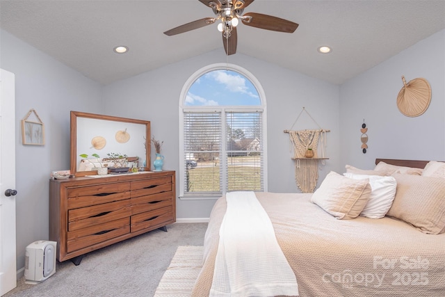 bedroom featuring lofted ceiling, ceiling fan, recessed lighting, light colored carpet, and baseboards