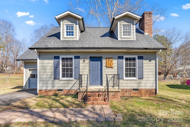 cape cod home with crawl space, driveway, a chimney, and roof with shingles