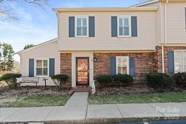 view of front of property with brick siding