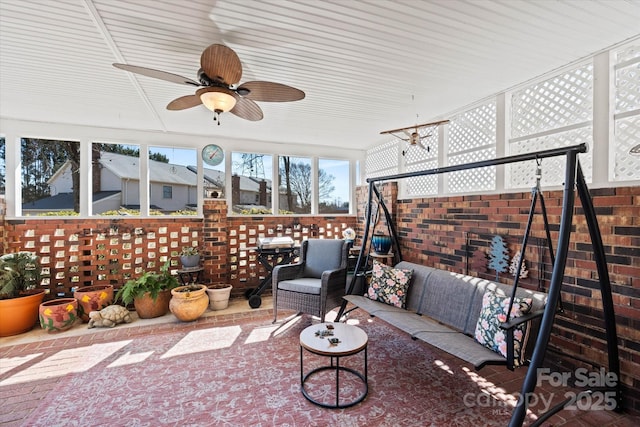 view of patio with outdoor lounge area and a ceiling fan