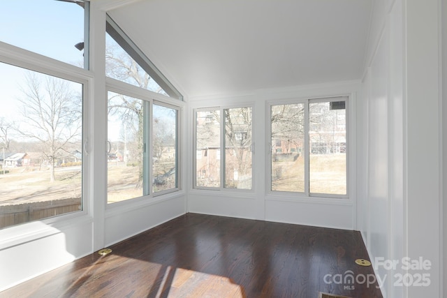 unfurnished sunroom with lofted ceiling and a healthy amount of sunlight