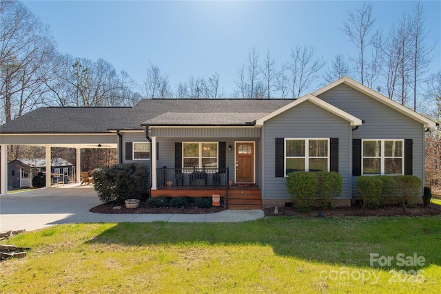 ranch-style house featuring a carport, driveway, a porch, and a front yard