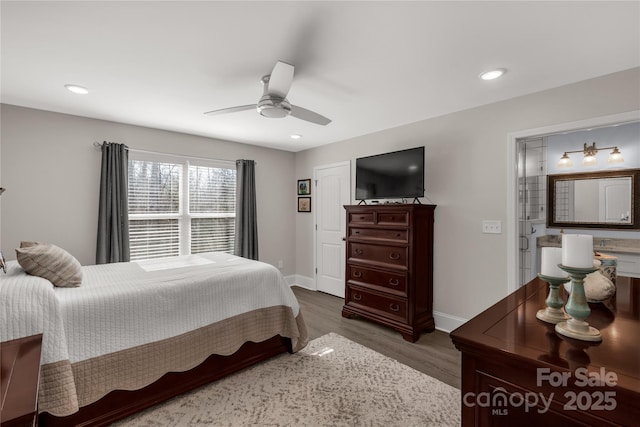 bedroom with dark wood-type flooring, recessed lighting, and baseboards