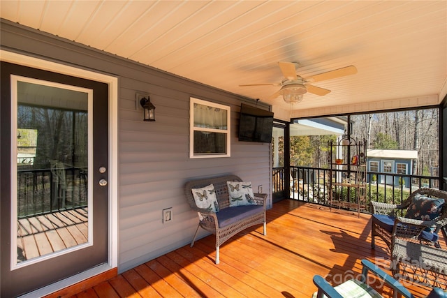 deck featuring a ceiling fan