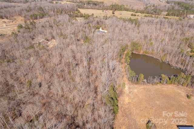 bird's eye view with a water view and a rural view