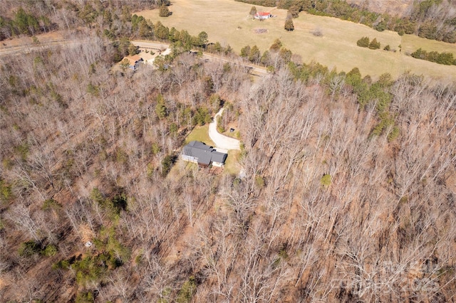 birds eye view of property featuring a rural view