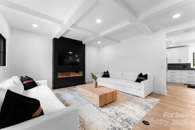 living room featuring light wood-style floors, recessed lighting, beam ceiling, and coffered ceiling