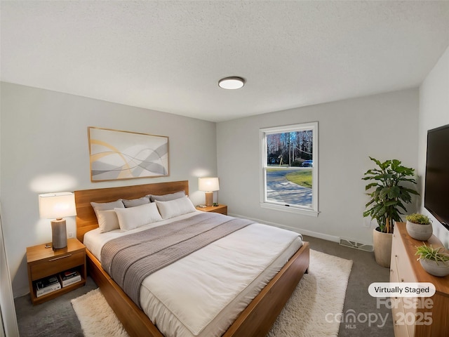 carpeted bedroom featuring baseboards