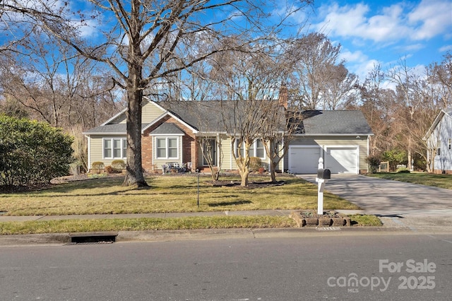 ranch-style house with a garage, driveway, and a front lawn