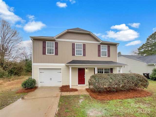 traditional-style home with a garage and driveway