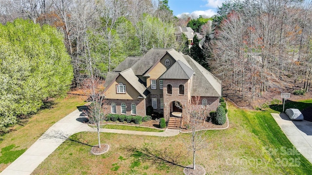 6548 Robin Hollow Dr, Mint Hill, NC 28227 - view of front of property featuring brick siding, driveway, and a front yard