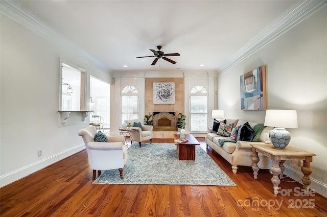 6548 Robin Hollow Dr, Mint Hill, NC 28227 - living area with baseboards, crown molding, a ceiling fan, and wood finished floors