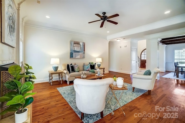 6548 Robin Hollow Dr, Mint Hill, NC 28227 - living area with ornamental molding, wood finished floors, recessed lighting, baseboards, and ceiling fan