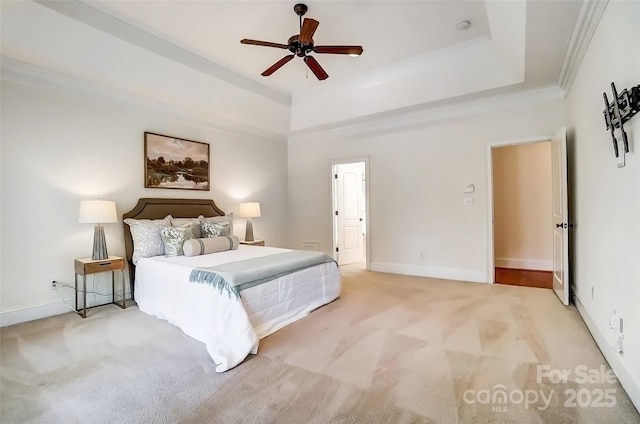 6548 Robin Hollow Dr, Mint Hill, NC 28227 - bedroom with baseboards, ceiling fan, crown molding, light carpet, and a raised ceiling